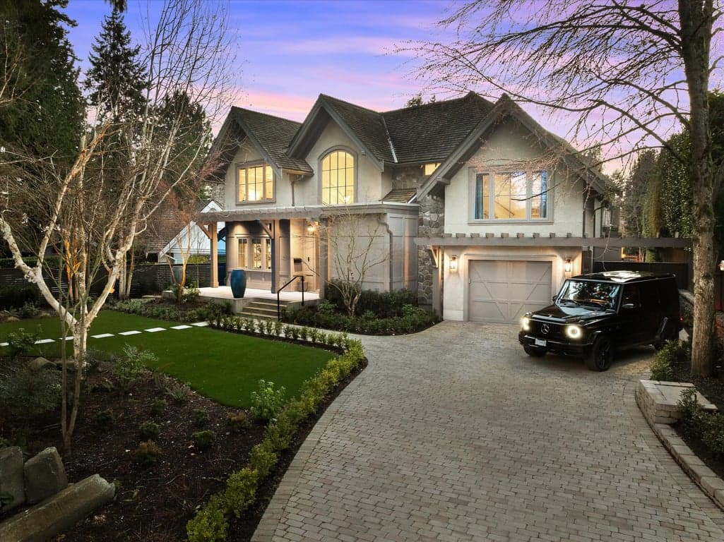 DISCOVER THIS STUNNING FAMILY HOME LOCATED STEPS TO THE BEACH ON WEST VANCOUVER'S MOST SOUGHT AFTER ERWIN DRIVE