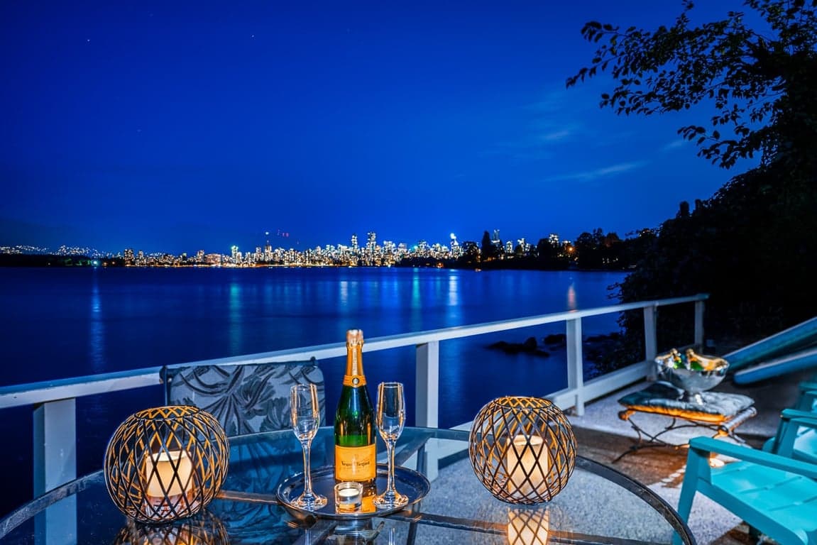 A IDEALLY SUTUATED WATERFRONT RESIDENCE ON VANCOUVER'S MOST PRIZED POINT GREY ROAD