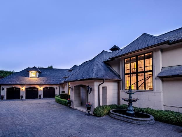 A MAGNIFICENT FRENCH COUNTRY MANSION SITUATED ON A PRIVATE VIEW ESTATE IN WEST VANCOUVER'S COVETED BRITISH PROPERTIES ENCLAVE